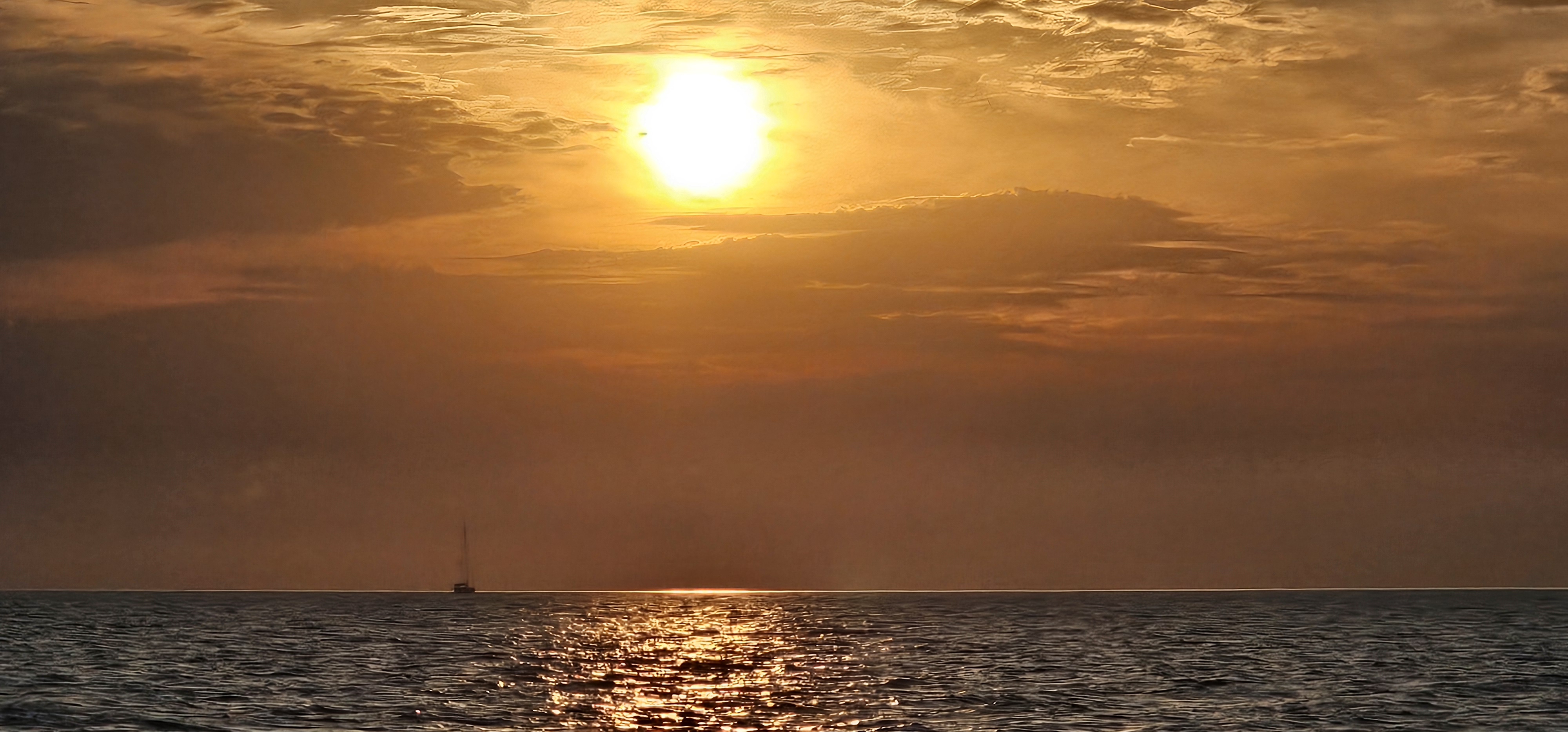 Morning coffee on deck with Mediterranean Sea view during sailing holiday